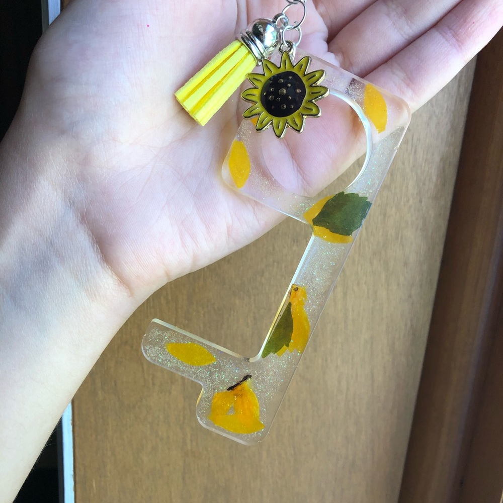 Resin keychain door opener with sunflowers